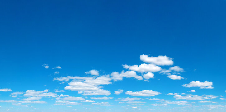 Sky with cloud on a sunny day. Panoramic fluffy cloud in the blue sky.