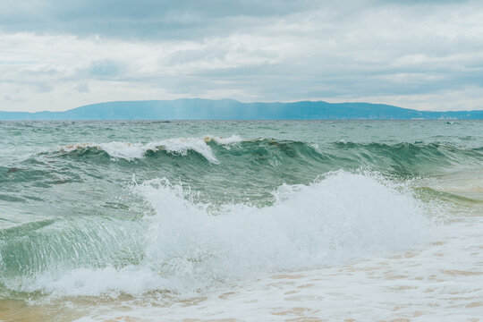 Powerful Ocean Waves Crashing on the Sandy Coast of Comporta, Portugal