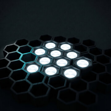 Glowing hexagonal cells in a dark honeycomb structure