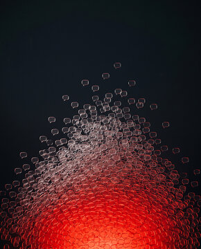 Mound of translucent cubes glowing red from within
