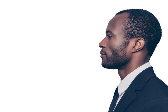 Side profile view portrait of smart experienced qualified clever strict head on big company clothed in black jacket and white shirt looking aside isolated on gray background copyspace