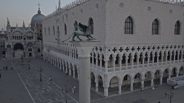 Aerial view of Doge's Palace and winged lion statue, Italy.