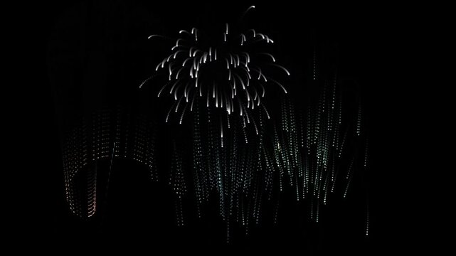 Digital fireworks animation with glowing white particles against a black background burst explosion light trails motion graphic effect celebration night dark sparkles abstract event festive holiday