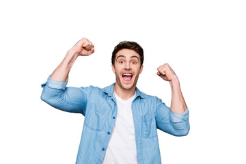 Fototapeta premium Portrait of lucky, attractive, excited, glad man with wide open mouth and raised arms looking at camera celebrating successfully passed exams, completed work, isolated on grey background