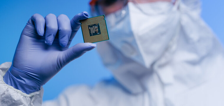 Scientist inspecting processor chip in cleanroom laboratory setting, concept control quality of semiconductor on lab of artificial intelligence factory banner