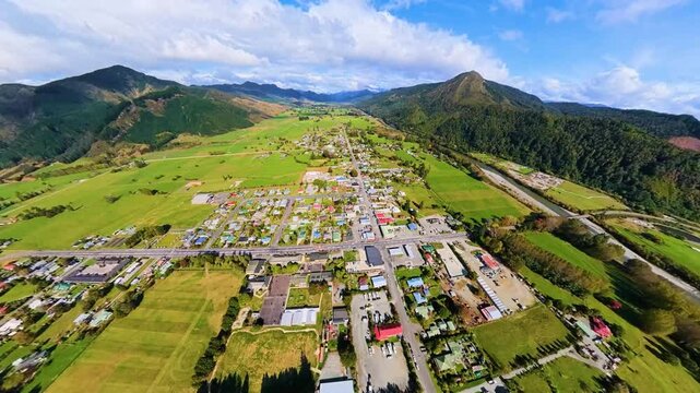 Aerial shots of New Zealand, pastoral towns in the valleys and plains