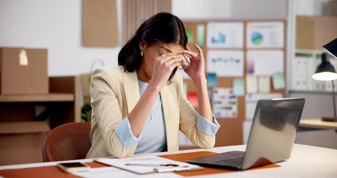 Ecommerce, woman and laptop with headache for stress, shipping stats error and tired from eye strain. Person, wrong glasses prescription and migraine in small business with computer, data or mistake.