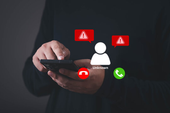Suspicious phone call concept, a person using a smartphone with warning icons and an unknown caller, representing scam, fraud prevention, phishing awareness, cybersecurity, privacy, and mobile safety.