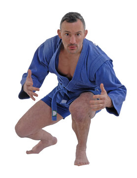 Martial arts fighter wearing blue kimono isolated on transparent layered background.