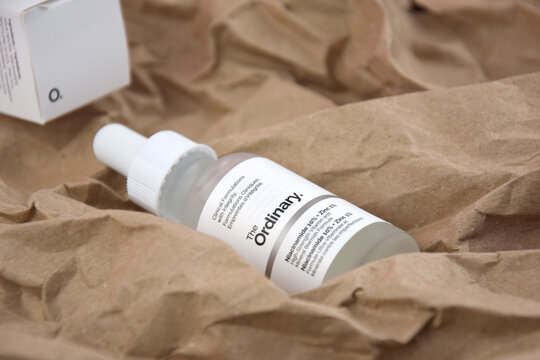 The ordinary cosmetic on the craft background.