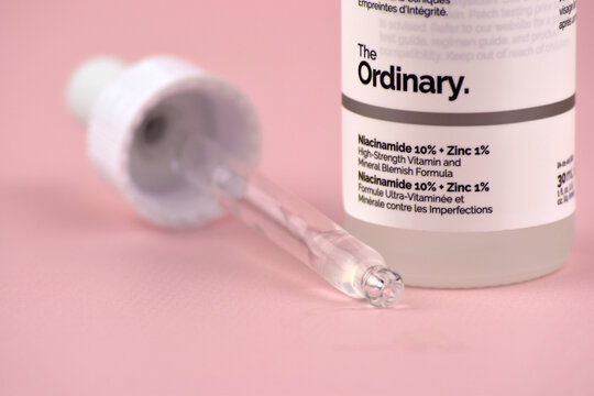 The ordinary cosmetics on the pink background.