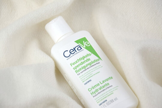 CeraVe cosmetics in the white package on the pink background.