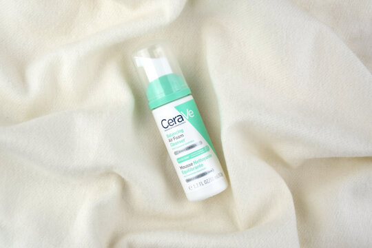 CeraVe cosmetics in the white package on the pink background.