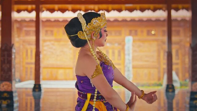 Traditional Dancer Looking Back Over Shoulder While Performing