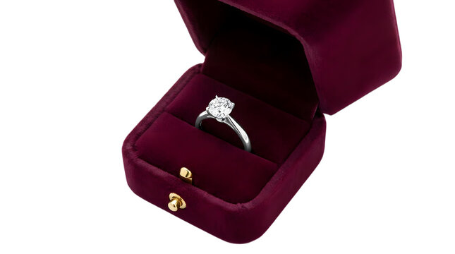 Elegant diamond engagement ring inside a luxury velvet box isolated on transparent background