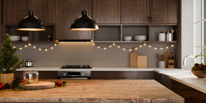 3D Illustration of Christmas Decorated Modern Kitchen with Wooden Countertop, Fairy Lights, and Festive Ornaments