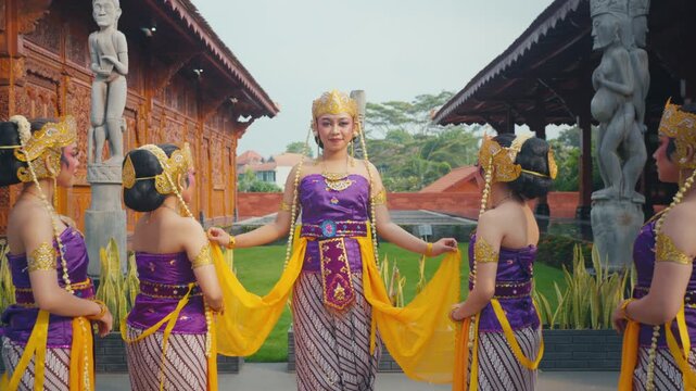Group of Dancers with Leader Spreading Yellow Sash in Center