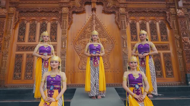 Symmetrical Formation of Javanese Dancers with One Standing and Four Seated