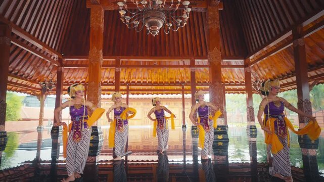 Traditional Dancers Moving Rhythmically in Line Formation
