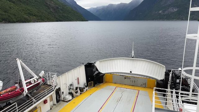 Bow part of car ferry during moving along Norwegian fjord