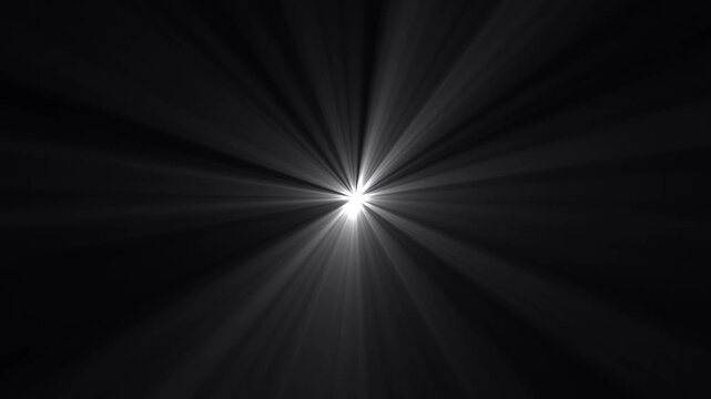 Heavenly light rays of dynamic sun steam. Rays of light flare shining footage. Cinematic white light beams streaming on black background. Volumetric sun rays lens flares burst movement animation.