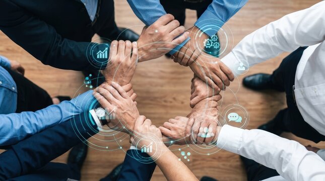 Diverse group of business people linking arms in a circle, symbolizing teamwork and unity in the workplace.