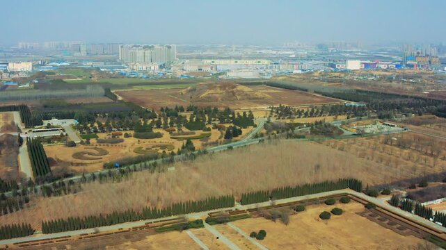 Aerial View of Landscaped Park and City Skyline in Xianyang, China