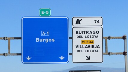A road information sign on the A-1 motorway in Spain, indicating the direction to Burgos and exit 74 for Buitrago del Lozoya and Villavieja del Lozoya September 15, 2026 © GenadiyGM