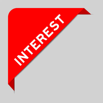 Red color of corner label banner with word interest on gray background