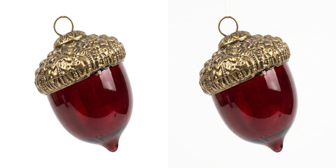 Christmas ornament shaped like a red acorn with an antique gold cap PNG isolated on transparent background for commercial graphic design use © Graphen