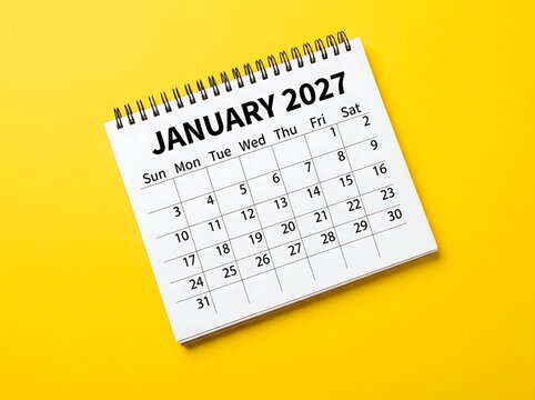 January 2027 calendar page on vibrant yellow background signifies beginning of new month.