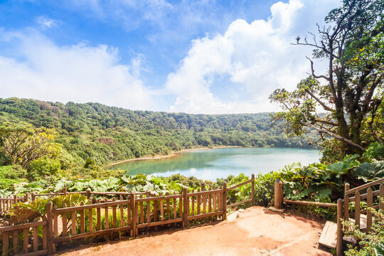 Wooden viewing platform overlooks the beautiful Botos Lagoon inside Poas Volcano National Park in Alajuela, Costa Rica