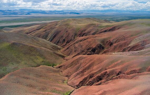 Aerial from drone of Altai mountain landscape in Altai mountains. Red clay canyon near village Kororya.