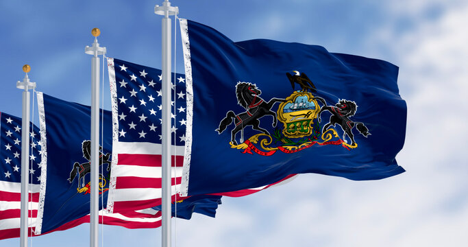 Pennsylvania state flag waving with the american flag