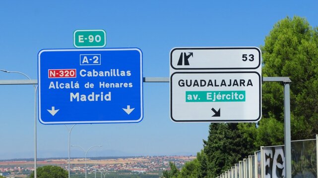 Road information sign on the A-2 motorway in Spain, indicating the direction to Alcal&aacute; de Henares and Madrid, and exit 53 to Guadalajara.August 30, 2026.