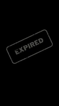 Grungy grey expired rubber stamp imprint isolated on a solid black background.