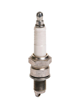A close up view of a metal and ceramic ignition component used in internal combustion engines for reliable vehicle performance and repair projects