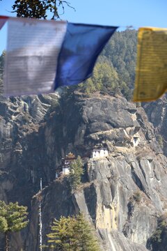 Tiger's Nest monastery on the cliff with prayer flags, Paro
