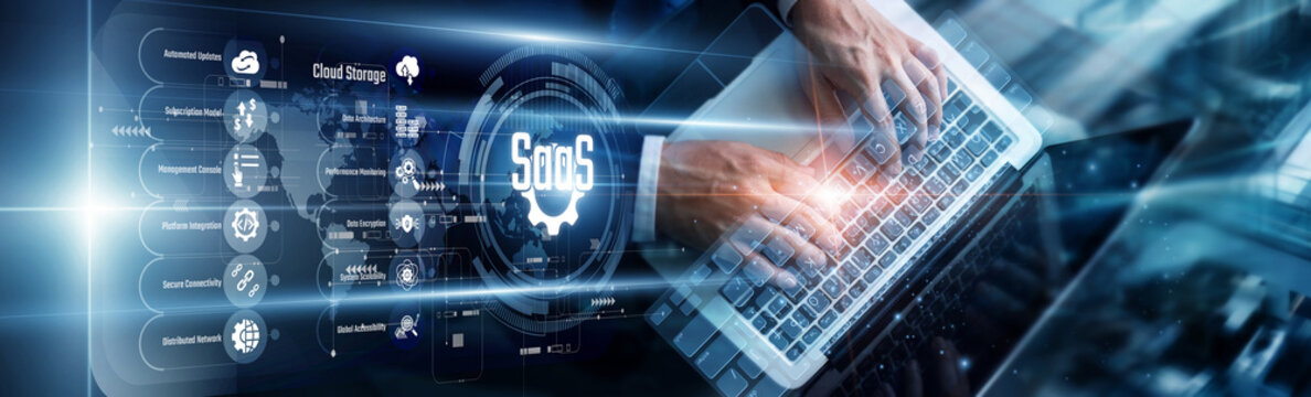 Product manager using a laptop to analyze software as a service platform performance metrics. This development improves user retention, feature scaling, and global cloud accessibility levels.