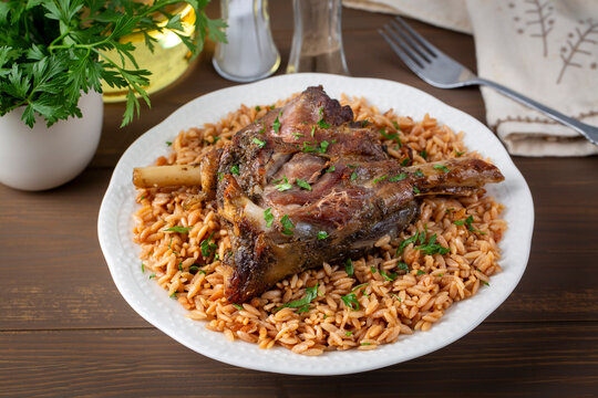 Local Turkish food; Lamb on barley noodle. Turkish name; Ankara Tava or sehriyeli pilav ustu kuzu incik