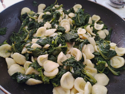 typical handmade pasta from southern Italy called orecchiette, served with broccoli rabe