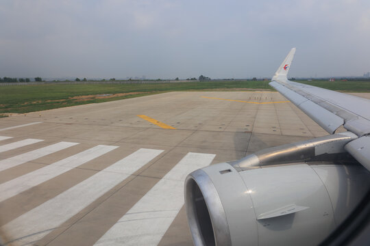 China Eastern Airlines Boeing 737-800 wing flying above clouds on August 18, 2025 in Shanghai, China