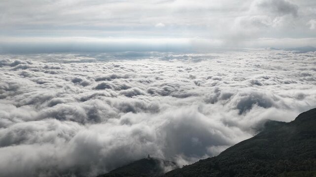 Aerial view of Pico da Caledonia above clouds, Brazil.