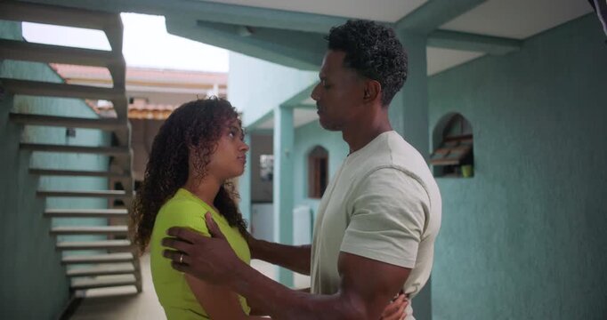 Father and teenage daughter hugging tightly with joyful expressions, radiating love and affection, family support and connection of African descent