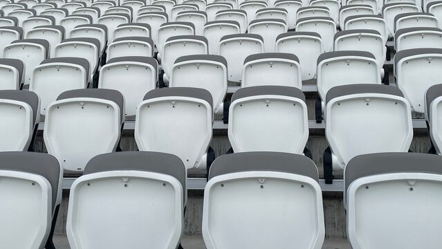 Full frame close-up of rows of Empty folded stadium seats