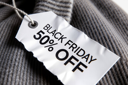 Black Friday 50% Off Sale Tag on Grey Knitwear. AI generated