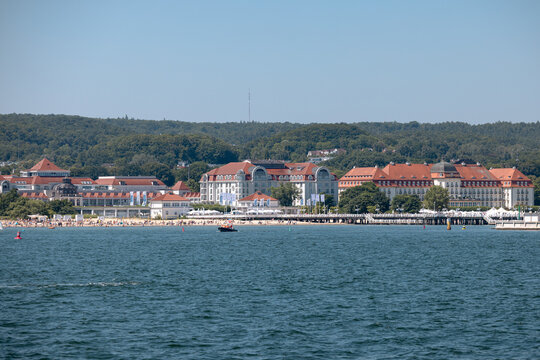 Sopot, Poland - July 16, 2026: Baltic seaside resort of Sopot stretches along the Bay of Gdańsk with beaches, waterfront buildings and sailboats offshore.