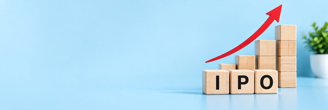 IPO initial public offering concept with wooden blocks forming a growing financial chart with a red upward trending arrow on a blue background