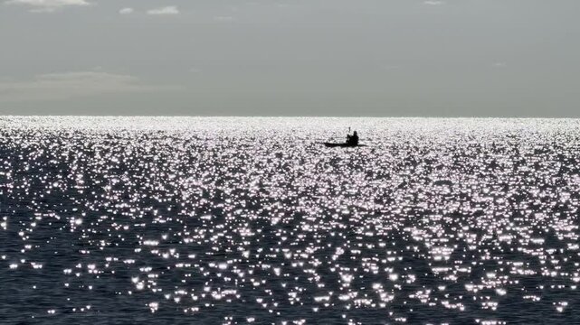 Kayaker Silhouette on the Ocean at Sunset on Cape Cod