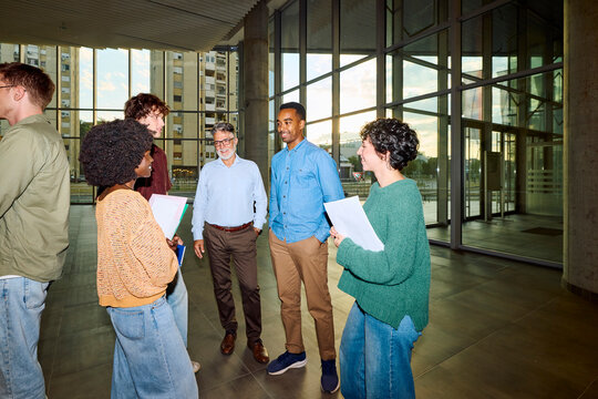 Students talk to their professor at the universtiy